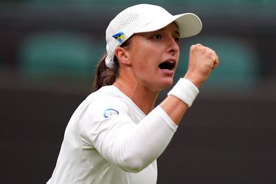 Top seed Iga Swiatek races through first-round match at Wimbledon