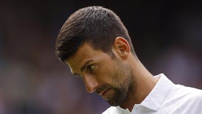 Unruffled Djokovic surges past Cachin into second round at Wimbledon