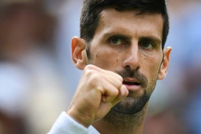 Djokovic shines at 'holy grail' Wimbledon as Russians return