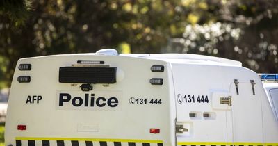 Man runs, woman assaults police after allegedly stealing alcohol