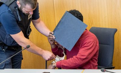A man who attacked 2 girls with a knife in Germany and killed 1 is sentenced to life in prison