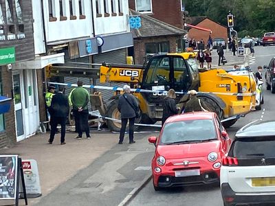 Man arrested after bid to steal supermarket ATM with crane