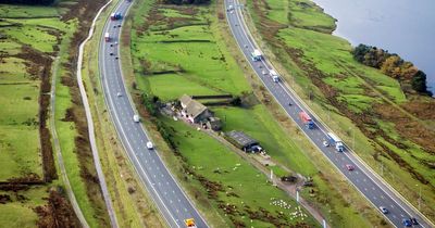 'We live between one of UK's busiest motorways - it's bleak and noisy but we're happy'