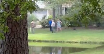 Woman killed by ALLIGATOR while walking dog before reptile 'guards' her dying body