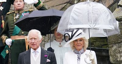 King attends royal Edinburgh garden party where rain hailed as 'next year's whisky'