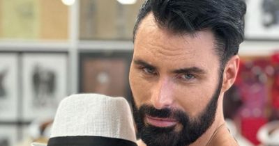 Rylan Clark claps back with 'gay love' as he's seen shirtless with 'new man' after ditching the UK again