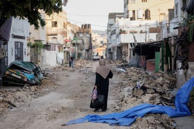 Palestinians inspect damage after Israel ends raid of West Bank camp and warns it was not a one-off