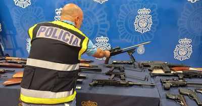 Chilling images show huge haul of deadly weapons 'linked to Irish cartel' seized by Spanish cops