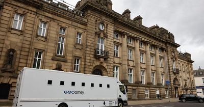 Woman charged with murder of baby and assault of one-year-old girl