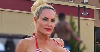 OnlyFans' Coco Austin poses in busty patriotic swimsuit at Fourth of July 'staycation' with family