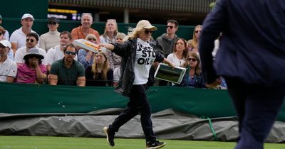 Play halted at Wimbledon as Just Stop Oil protestors storm court and disrupt match