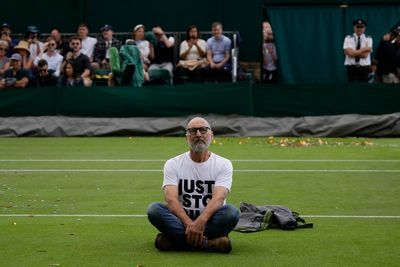Environmental activists disrupt play at Wimbledon during match on Court 18