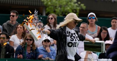 Play halted at Wimbledon as Just Stop Oil protesters storm court and disrupt match