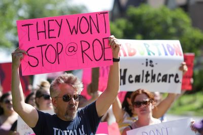 Iowa's Republican governor calls a special legislative session to revive abortion restrictions