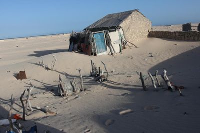 ‘Swallowed by the sand’: Somalia’s coastal towns succumb to the desert