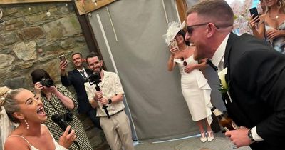 Bride's heartfelt wedding day surprise for groom seen by thousands