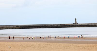 Two swimmers rescued by lifeguard after getting cut off by tide in South Shields