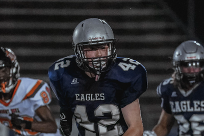 Boy who got prosthetic arm from ‘Iron Man’ now playing linebacker in high school