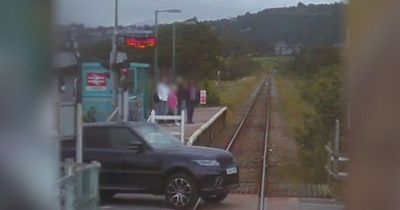 Driver caught on CCTV in closest near miss train driver has ever had