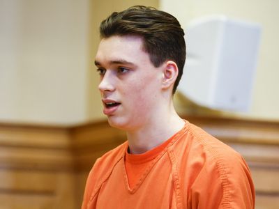 An Iowa teenager receives life for the beating death of his high school teacher