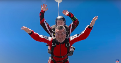 Roy Keane channels inner James Bond as he skydives from 15,000 feet