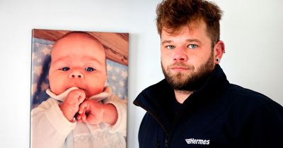 Father woke up to find his baby son had died beside him in bed