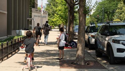 Could housing migrants at 12th District police station lead to better community relations?