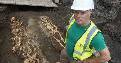 Remains of 100 people buried in medieval mass grave found under planned hotel site