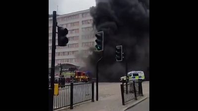 Moment bus drives through east London supermarket fire in Forest Gate
