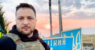 Zelensky visits island where soldiers told Russian warship to go 'f*** itself'