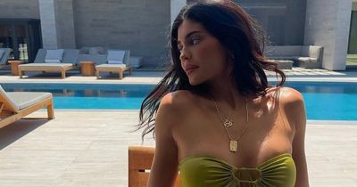Kylie Jenner drives fans wild with latest 'happy' poolside bikini shoot