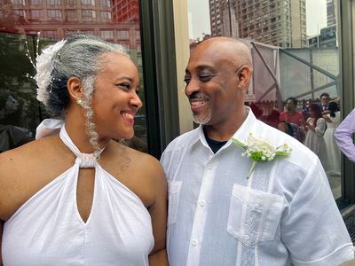 At New York's Lincoln Center, love is definitely in the air with a post-pandemic mass wedding