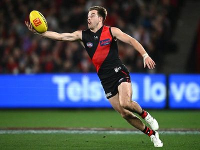 Bombers brush Crows, surge to fifth spot in AFL