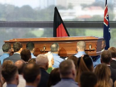 Officer 'cruelly robbed of his future' laid to rest