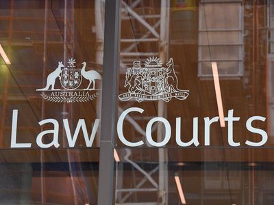 Man bailed on DV charges as woman's death probed
