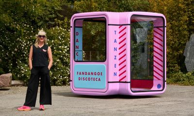 ‘People want to shake it out’: dance away the tears at a ‘grief rave’ in a pink disco kiosk