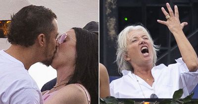Katy Perry and Orlando Bloom passionately snog as they join celebs at Bruce Springsteen