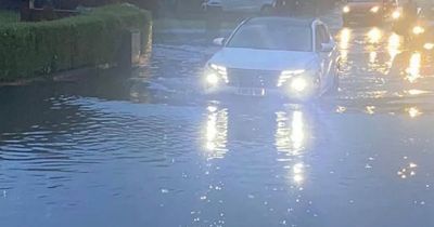Major floods spark residents to leave cars abandoned in road after UK thunderstorms
