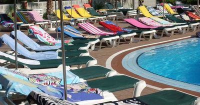 Hotel worker brutally removes 'reserved' towels from holiday sun loungers in Tenerife