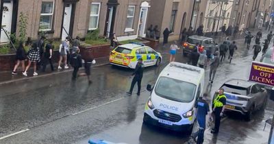 'Get off the street': Video shows police battle to control huge group of youths after house party 'got out of hand'