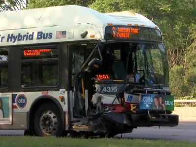 One dead and 15 injured after car driving wrong way crashes into Chicago bus
