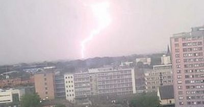 LIGHTNING hits Greater Manchester as region hit by heavy downpours