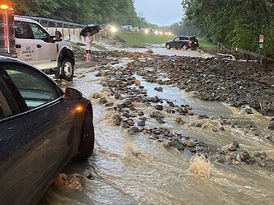 Extreme flooding overwhelms New York roadways, leaving 1 person dead