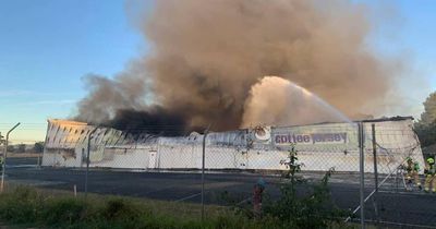 Over 100 firefighters battle large South Coast factory blaze