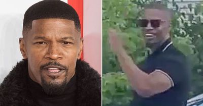Jamie Foxx smiles and waves as he is seen for the first time since mysterious health scare