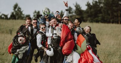 Amputee war hero skydives into his wedding with friends - and breaks a world record