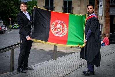 Afghan students celebrate after graduating from Scottish university
