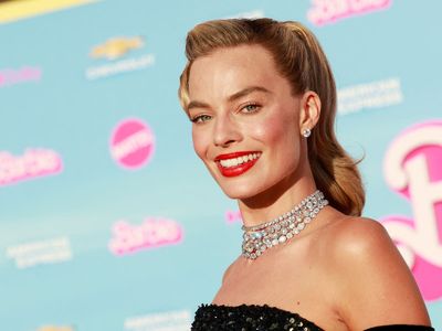 Margot Robbie hits Barbie red carpet in 1960s Mattel-inspired gown
