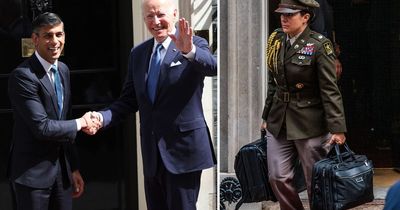 Joe Biden's nuclear briefcase spotted being carried out of Downing Street during UK visit