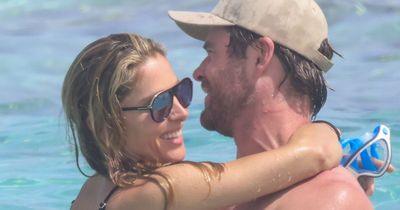 Chris Hemsworth and wife Elsa Pataky put on cosy display as they cuddle up in the sea